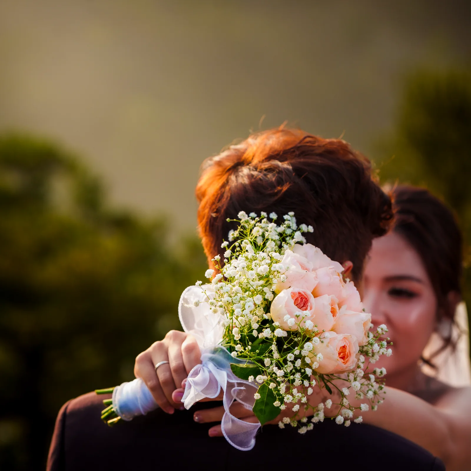She held the flowers gently